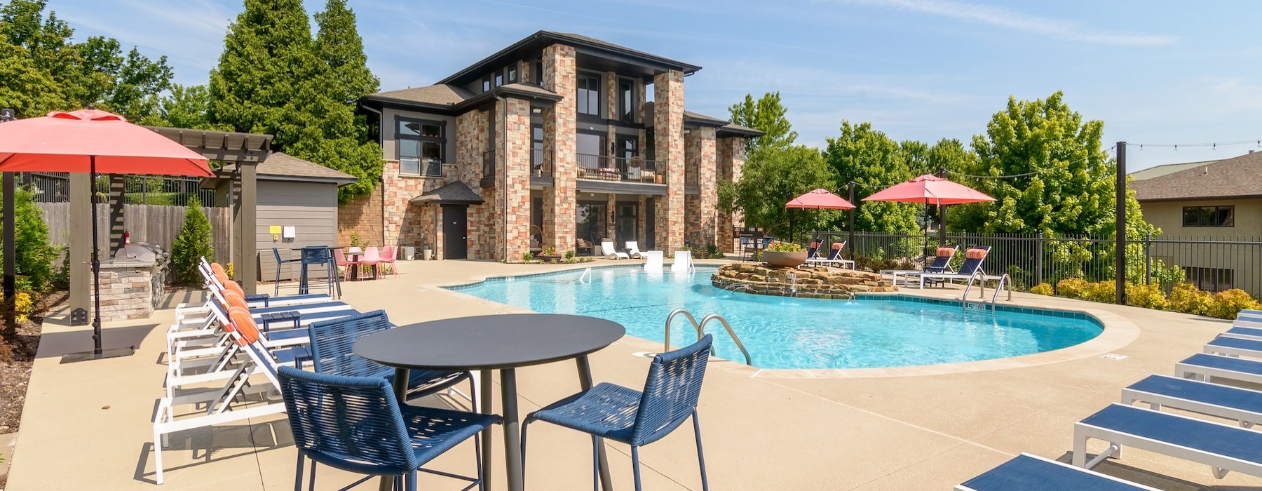 a pool with chairs around it