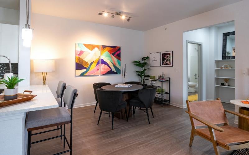 a room with a table and chairs