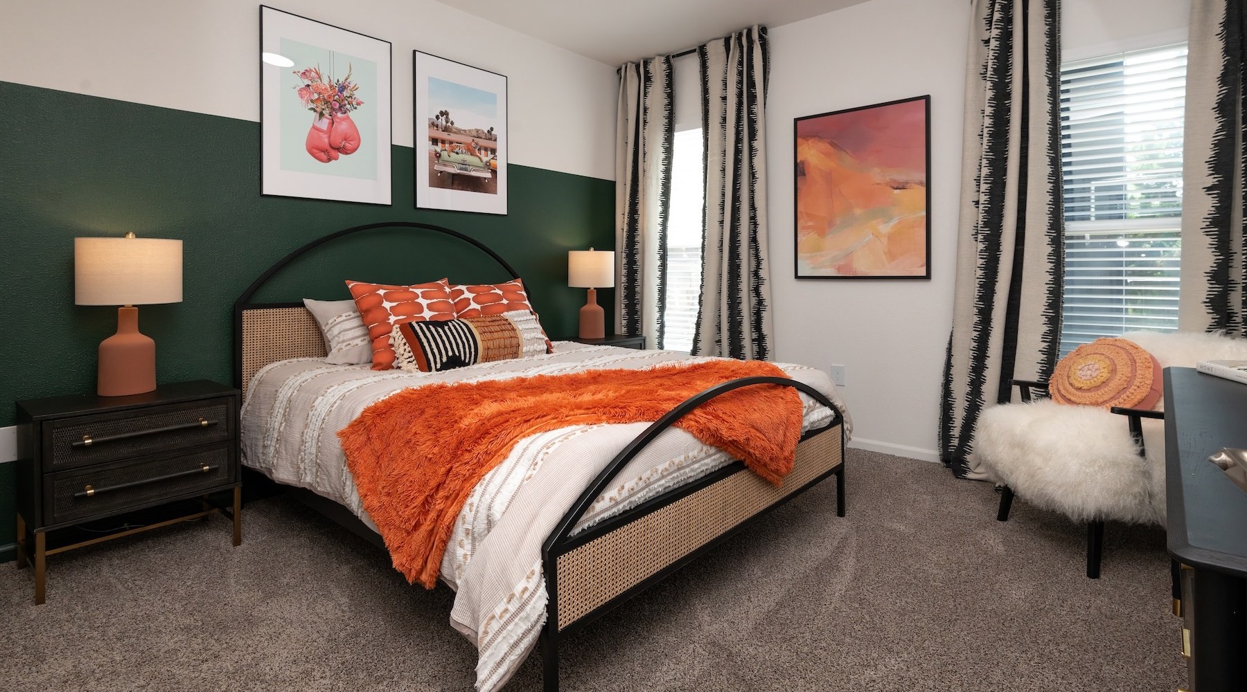 bedroom with bed lamps and windows